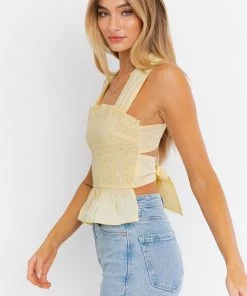 LE LIS Sleeveless Smocked Peplum Top