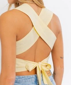 LE LIS Sleeveless Smocked Peplum Top