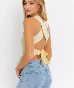 LE LIS Sleeveless Smocked Peplum Top
