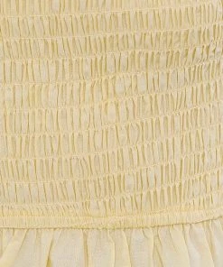 LE LIS Sleeveless Smocked Peplum Top