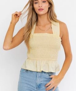 LE LIS Sleeveless Smocked Peplum Top